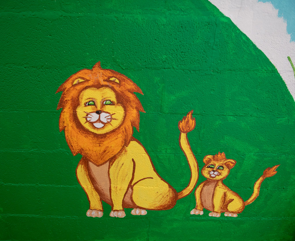 Lion and cub mural art